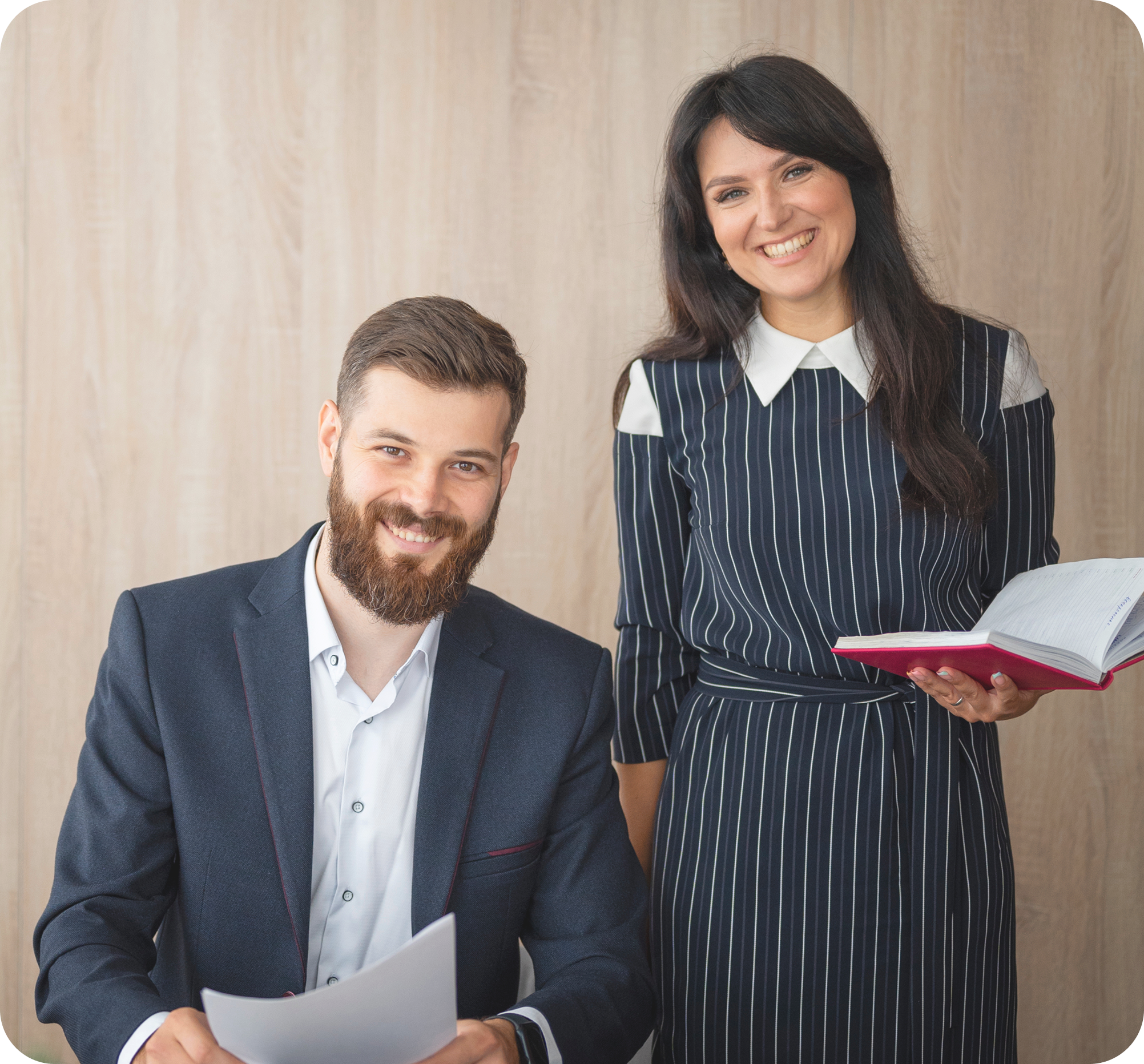 Professional business team - man and woman in office setting
